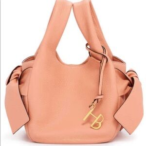 Henri Bendel mini Windsor bag soft pebbled leather in a muted clay/coral color.